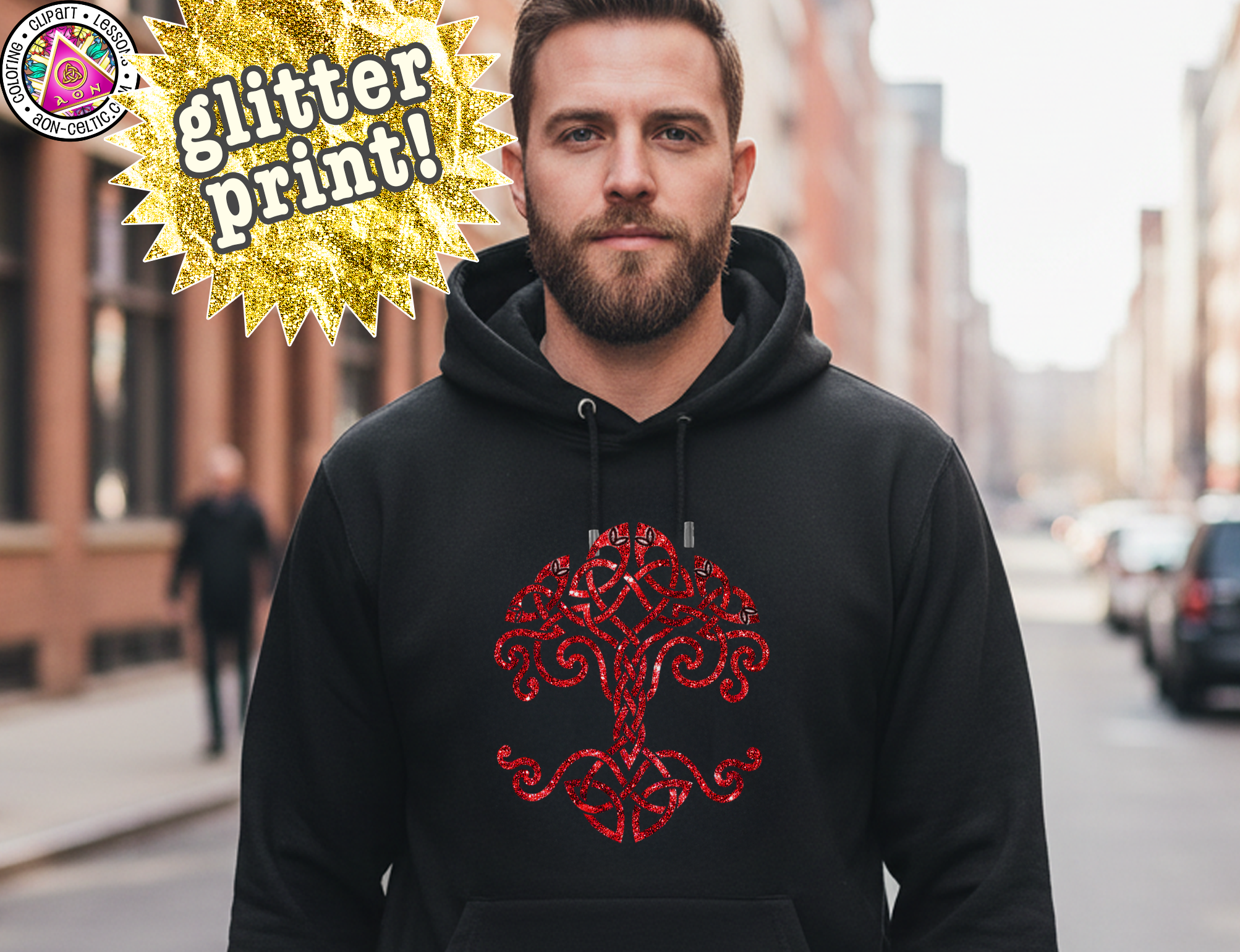 A man wearing a black hoodie with a red tree design stands on a city street, with a cityscape and buildings visible in the background.