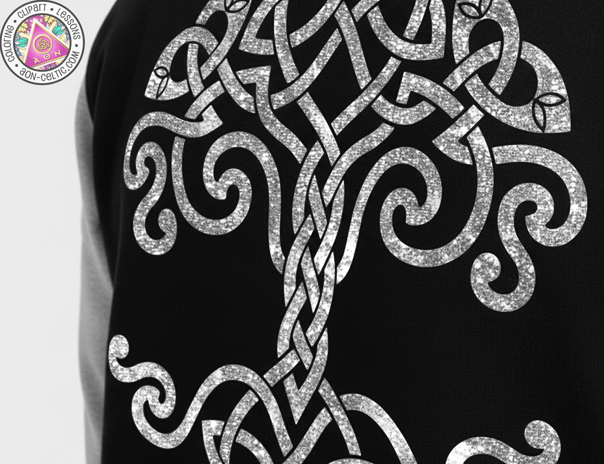 a close-up view of a black and white design on a person's back, depicting a tree with intricate, swirling patterns.