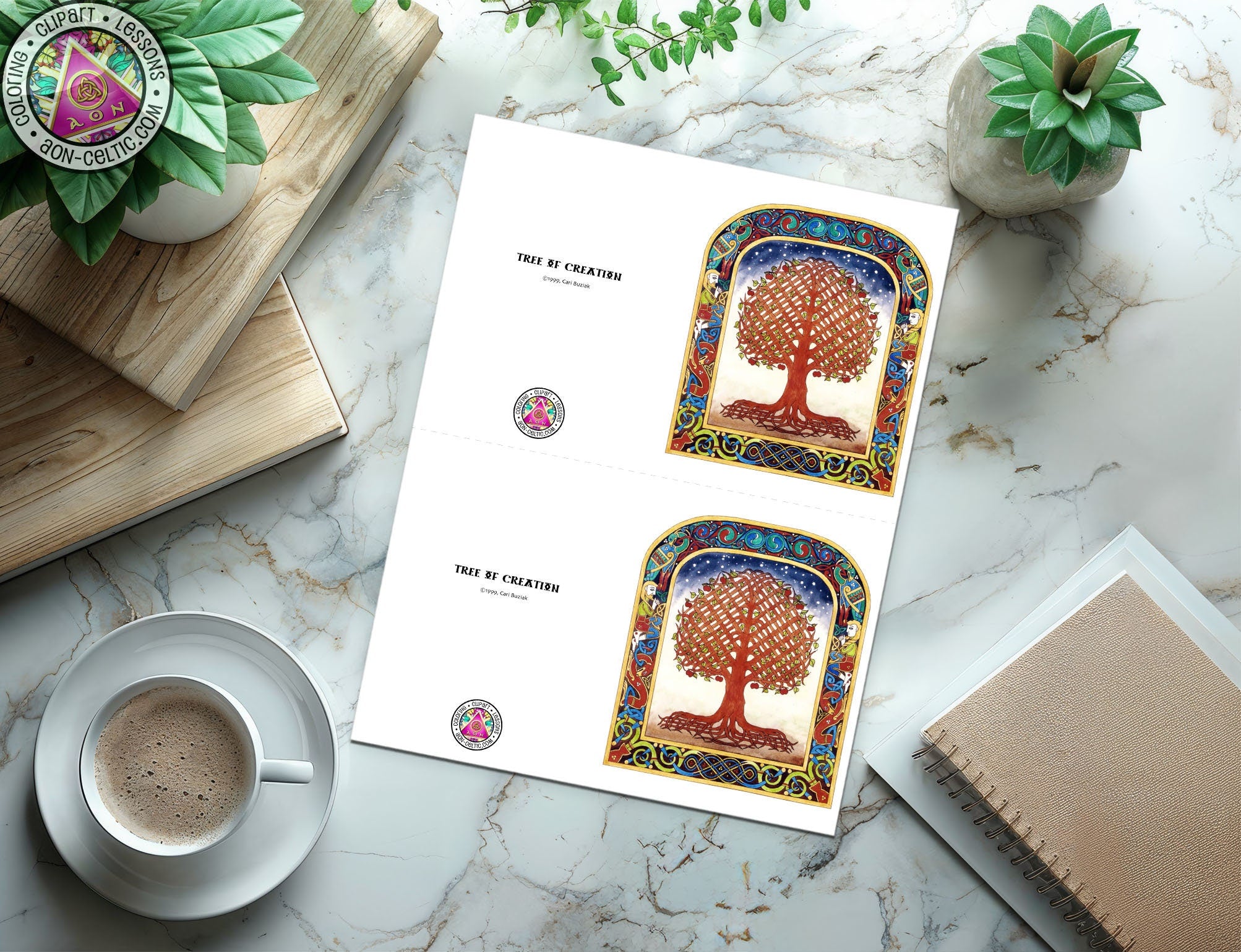 a cup of coffee sitting next to a book on top of a table