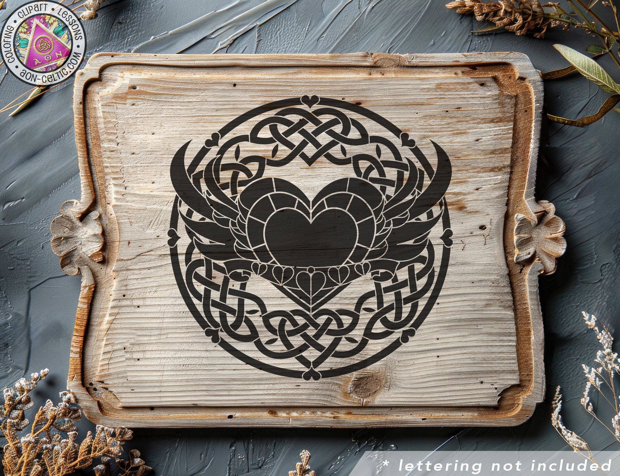 a wooden plaque with a heart and wings on it