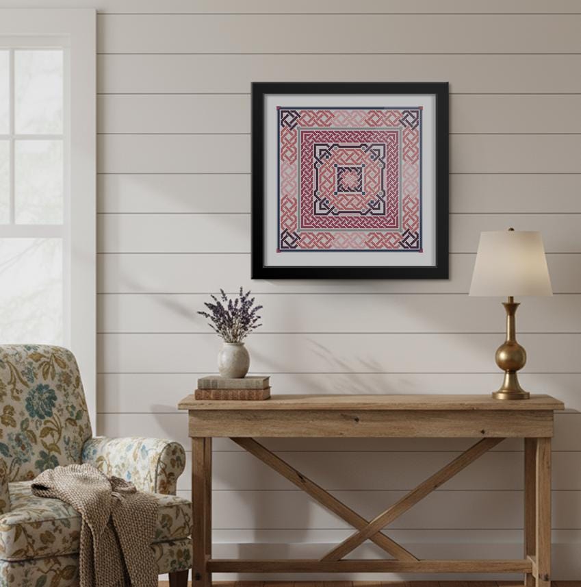 a cozy living room with a wooden console table, a floral armchair, and a framed artwork hanging on the wall.