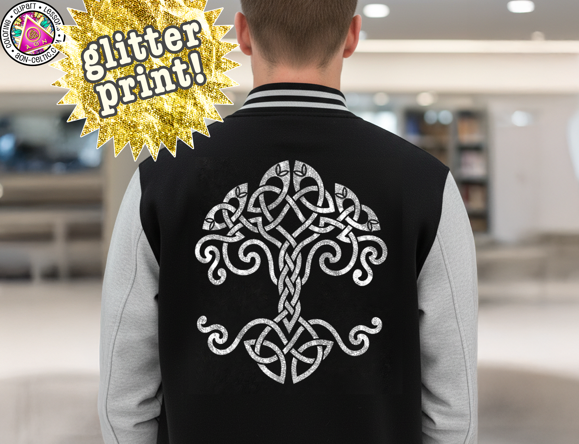 the back of a person wearing a black and gray jacket with a white tree design on the back.