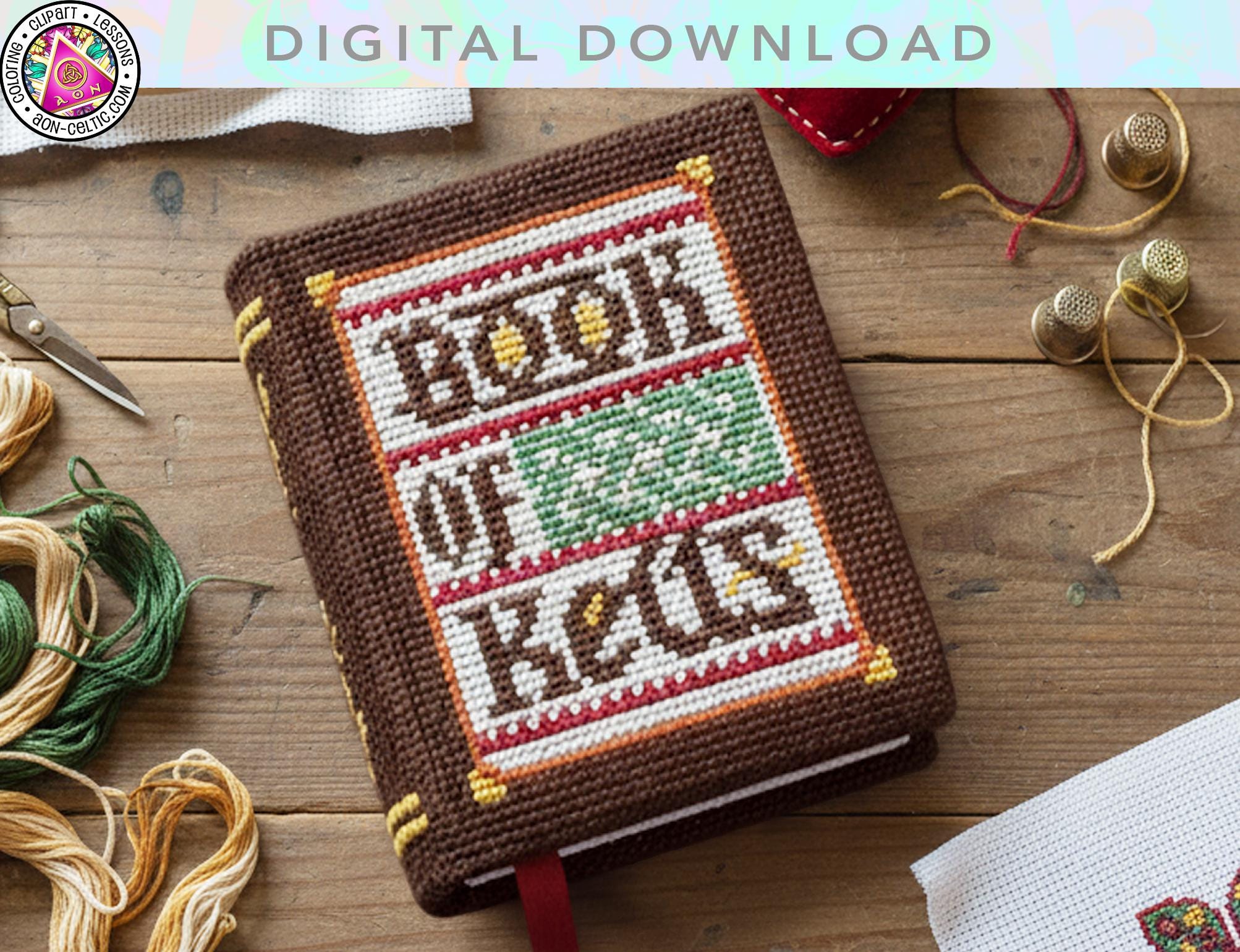 a hand-stitched book titled "Book of Keys" with a wooden cover, surrounded by various crafting supplies such as needles, thread, and scissors on a wooden surface.