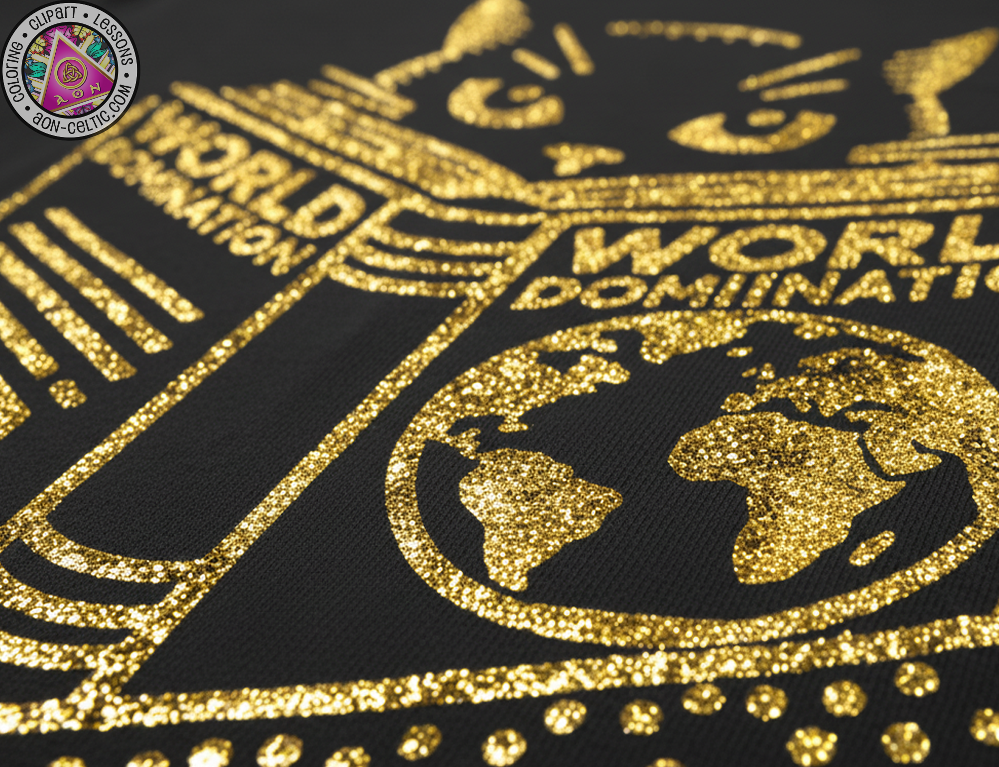 a close-up view of a black fabric with a gold glitter design. The design includes a globe and text that reads "WORLD DOMINATION".
