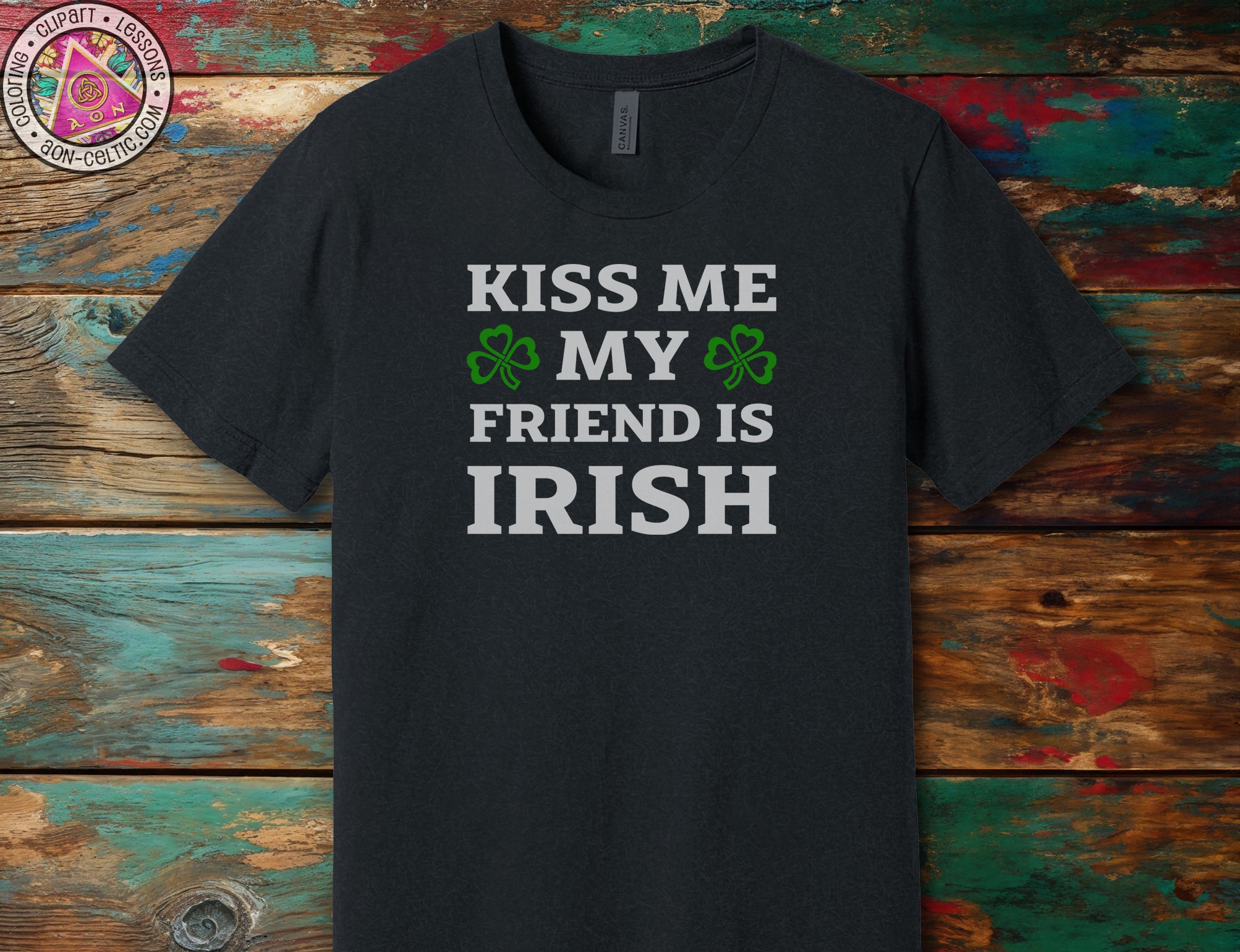 a black t - shirt that says kiss me my friend is irish
