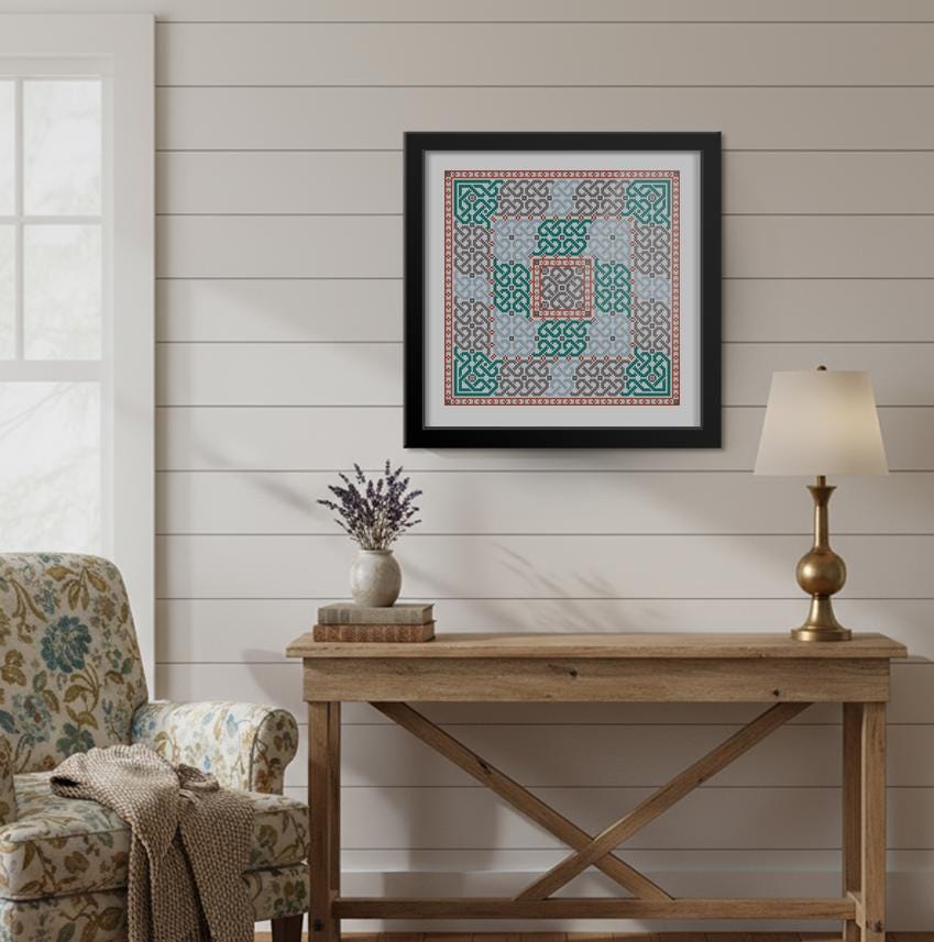 a cozy living room with a wooden console table, a floral armchair, and a framed artwork hanging on the wall.