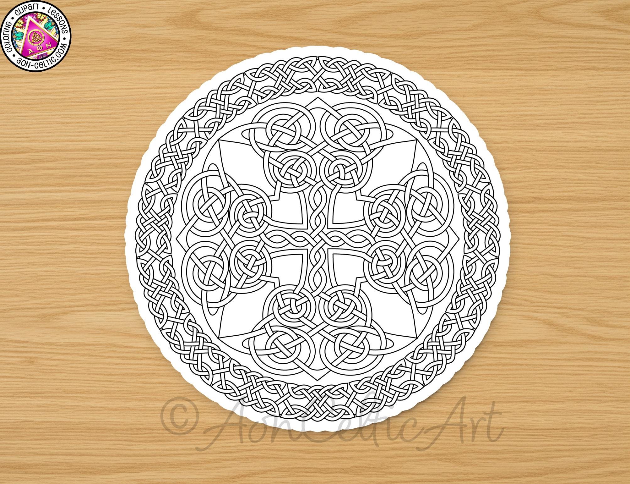 A detailed, intricate Celtic knot design in black and white, displayed on a wooden surface.