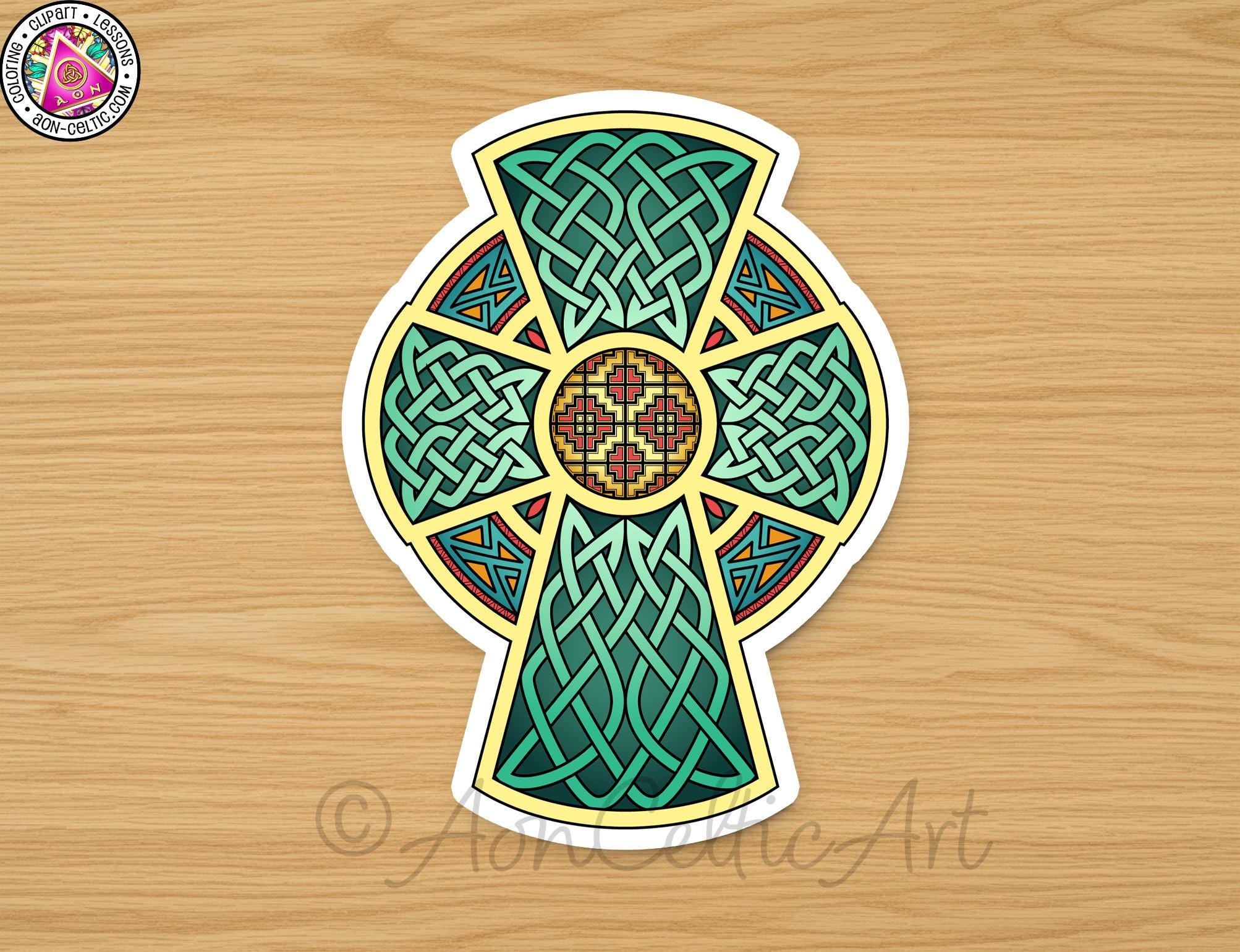 A colorful and intricate Celtic cross design on a wooden surface.