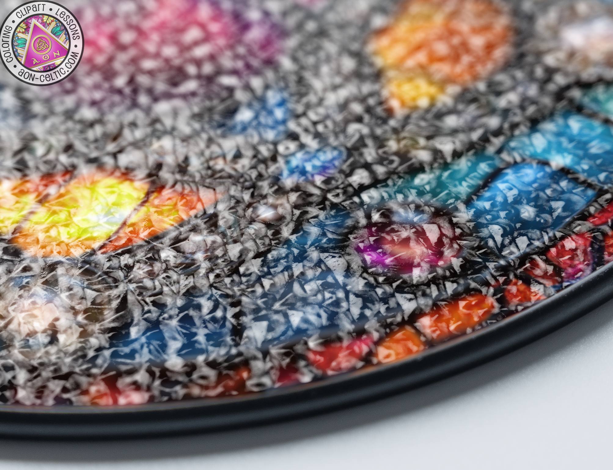 a close up of a plate with a colorful design on it