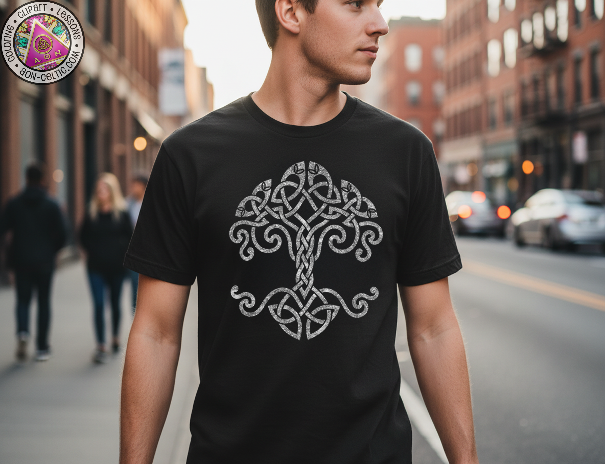 A man wearing a black t-shirt with a white tree design on it, walking down a city street.