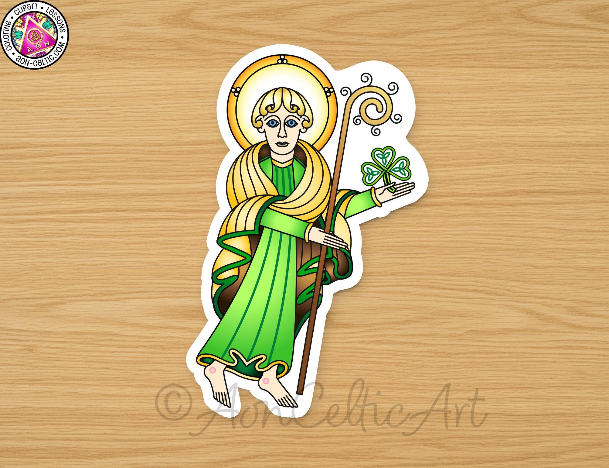 Sticker depicting a stylized figure of a saint or religious figure, wearing a green robe and holding a staff with a clover.