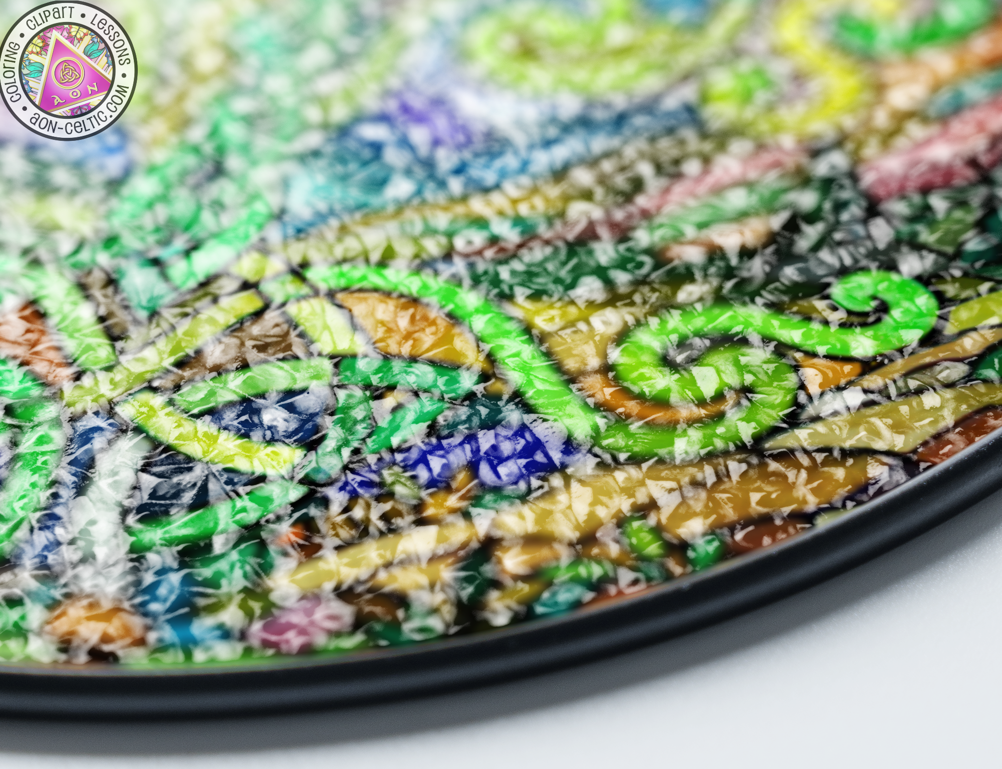 a close up of a plate with a colorful design on it