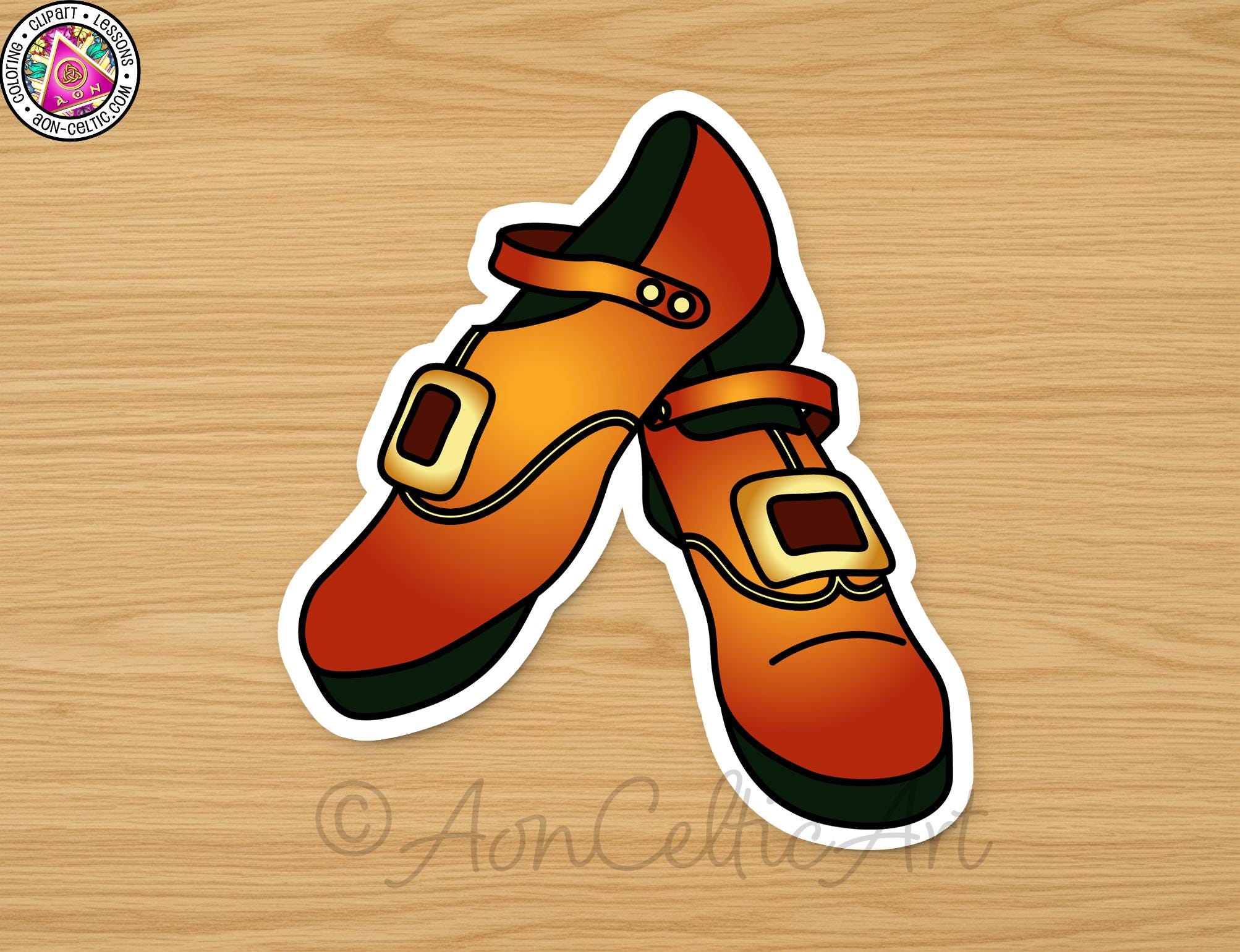 A pair of orange and green shoes with a strap across the top.