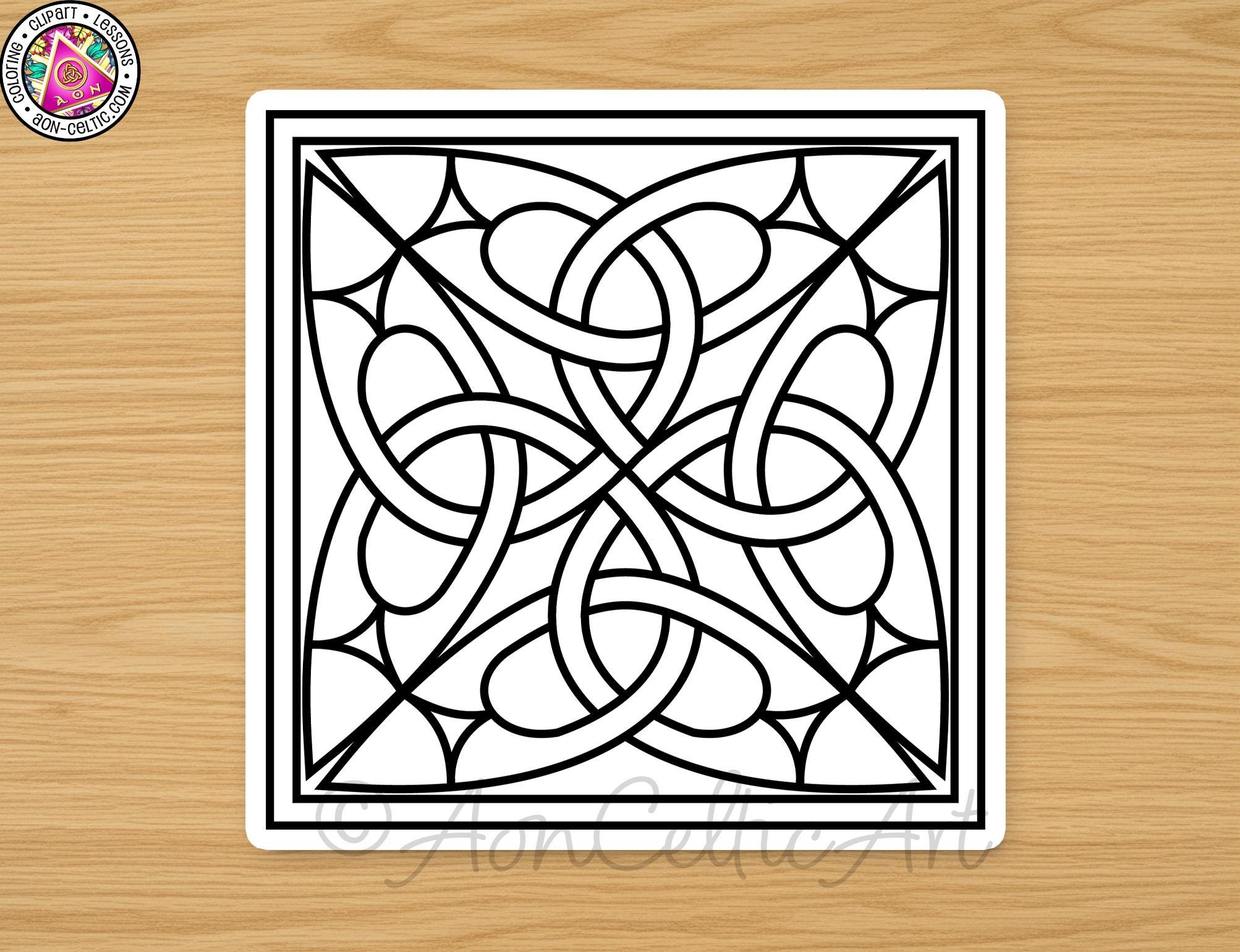 A black and white image of a geometric design with intricate patterns and shapes, displayed on a wooden surface.