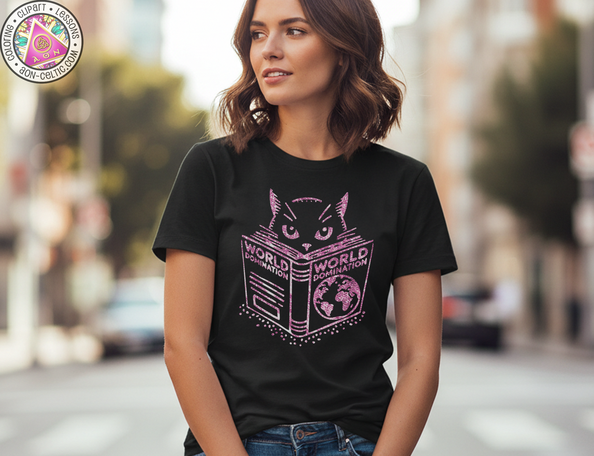 A woman wearing a black t-shirt with a graphic design of a cat's face and the text "WORLD DOMINATION" printed on it, standing on a city street.