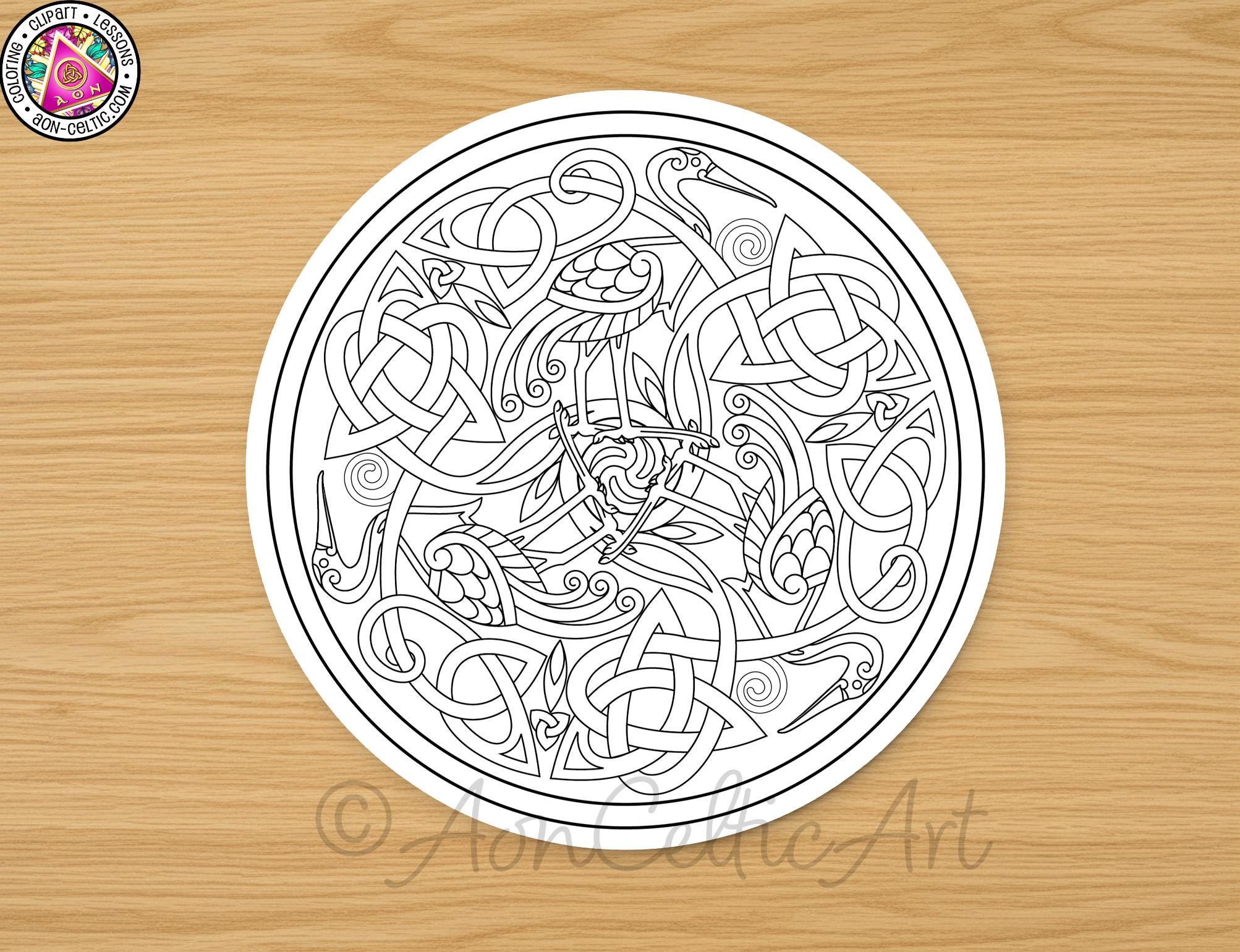 A circular design featuring intricate Celtic knot patterns and various bird motifs, including swans and storks, against a wooden background.