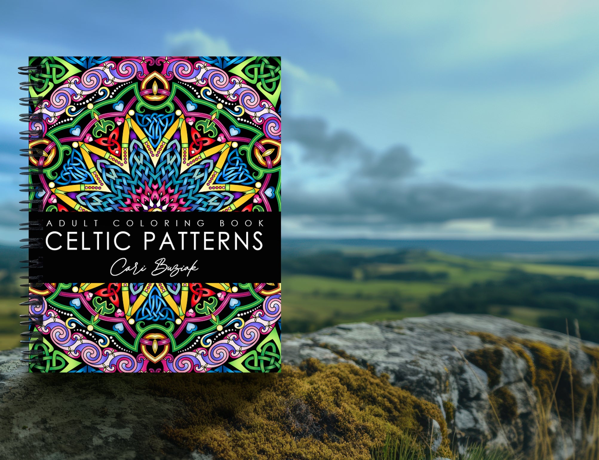 a coloring book sitting on top of a rock