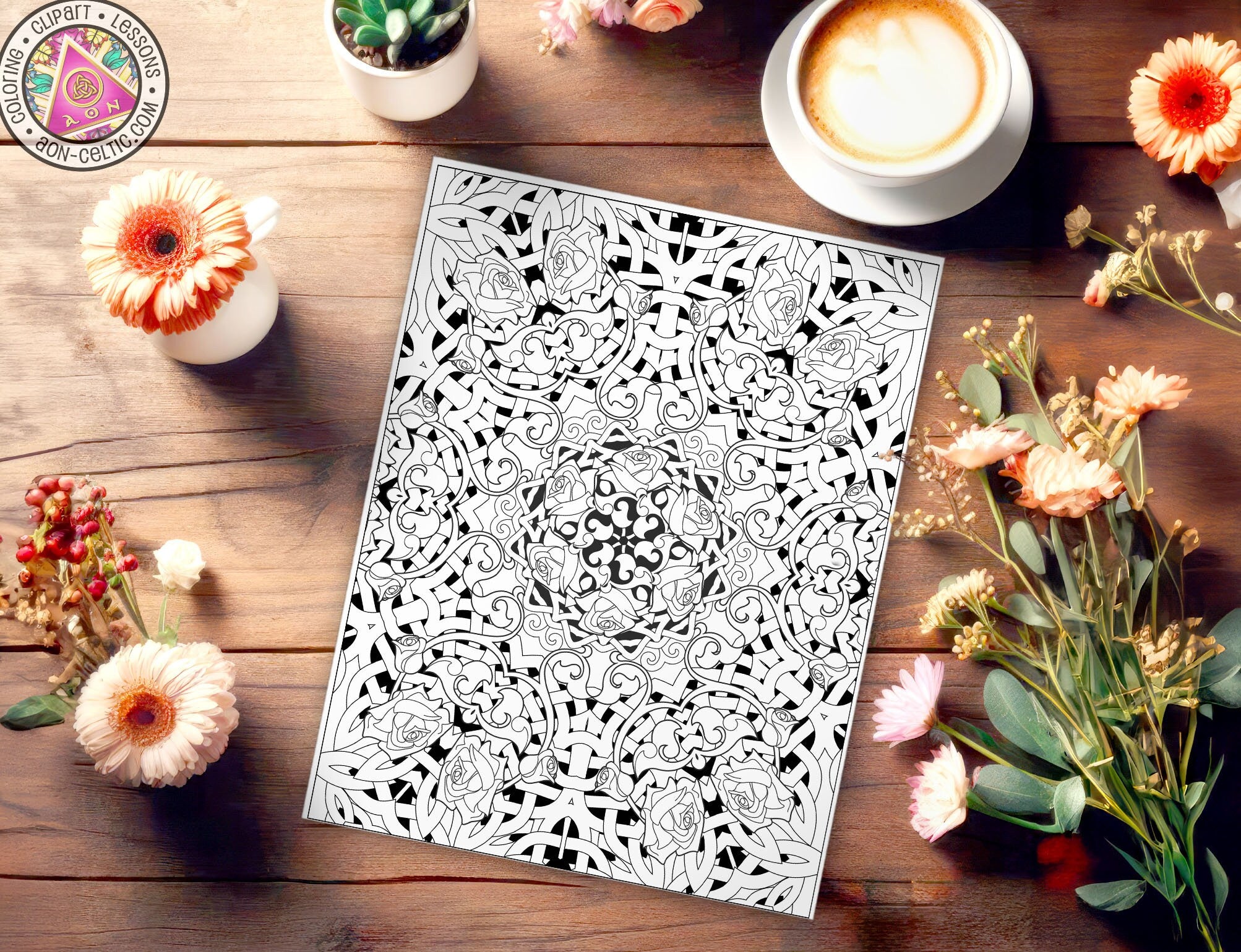 a table topped with lots of flowers next to a cup of coffee