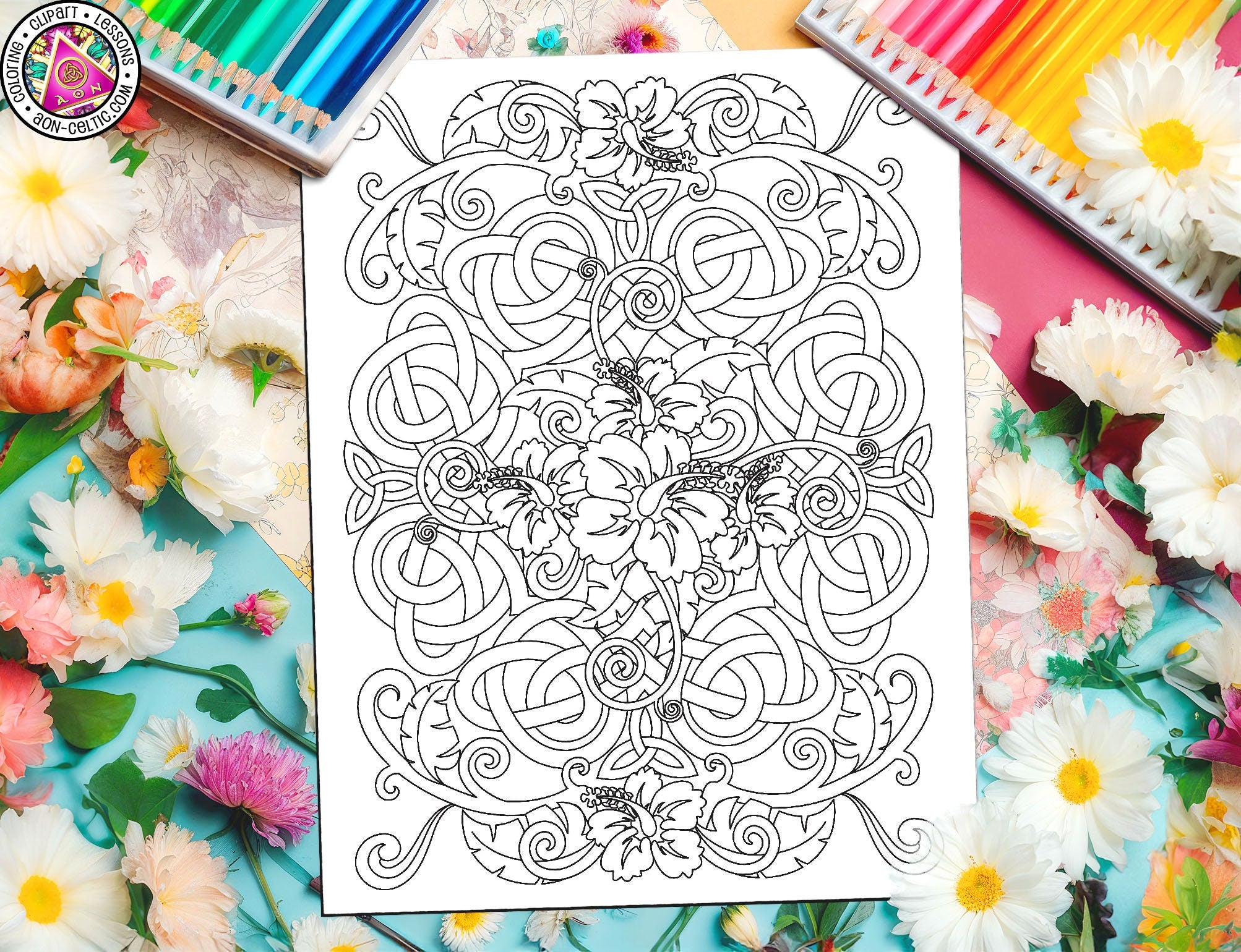 a coloring book surrounded by flowers and a cup of coffee