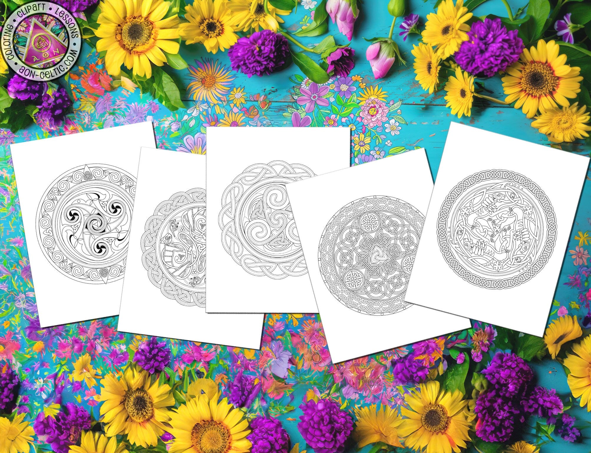four cards with different designs on them next to flowers