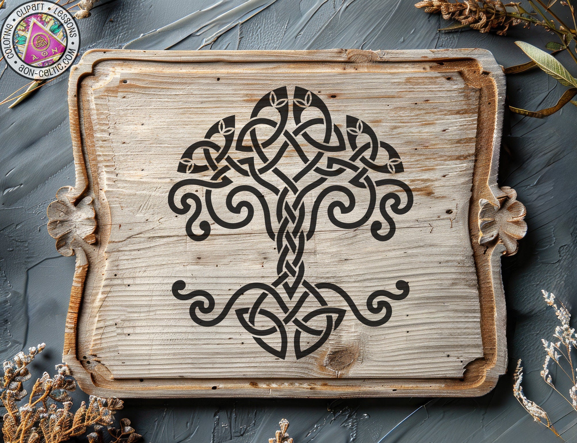 a wooden plaque with a decorative design on it