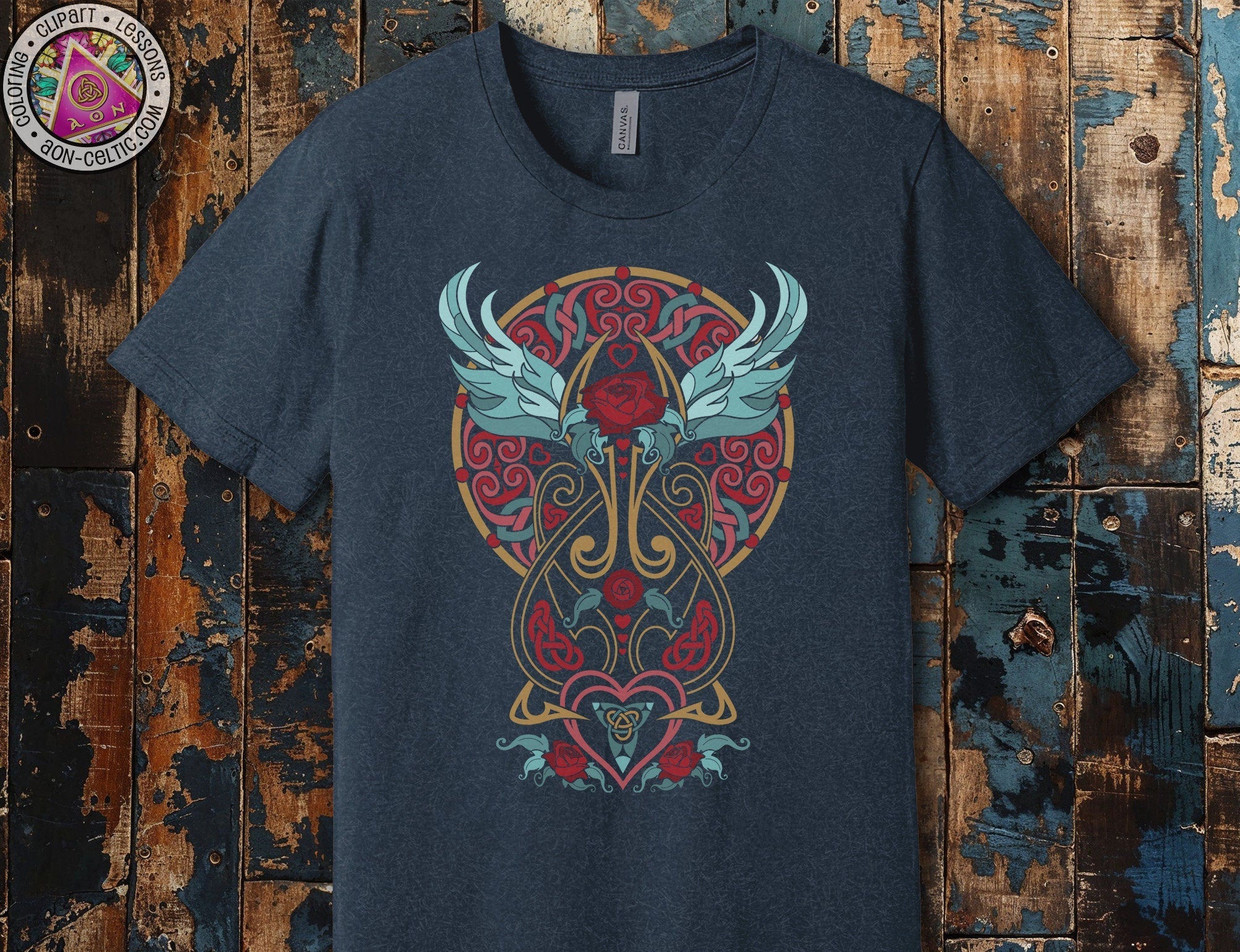 a t - shirt with a heart and wings on it