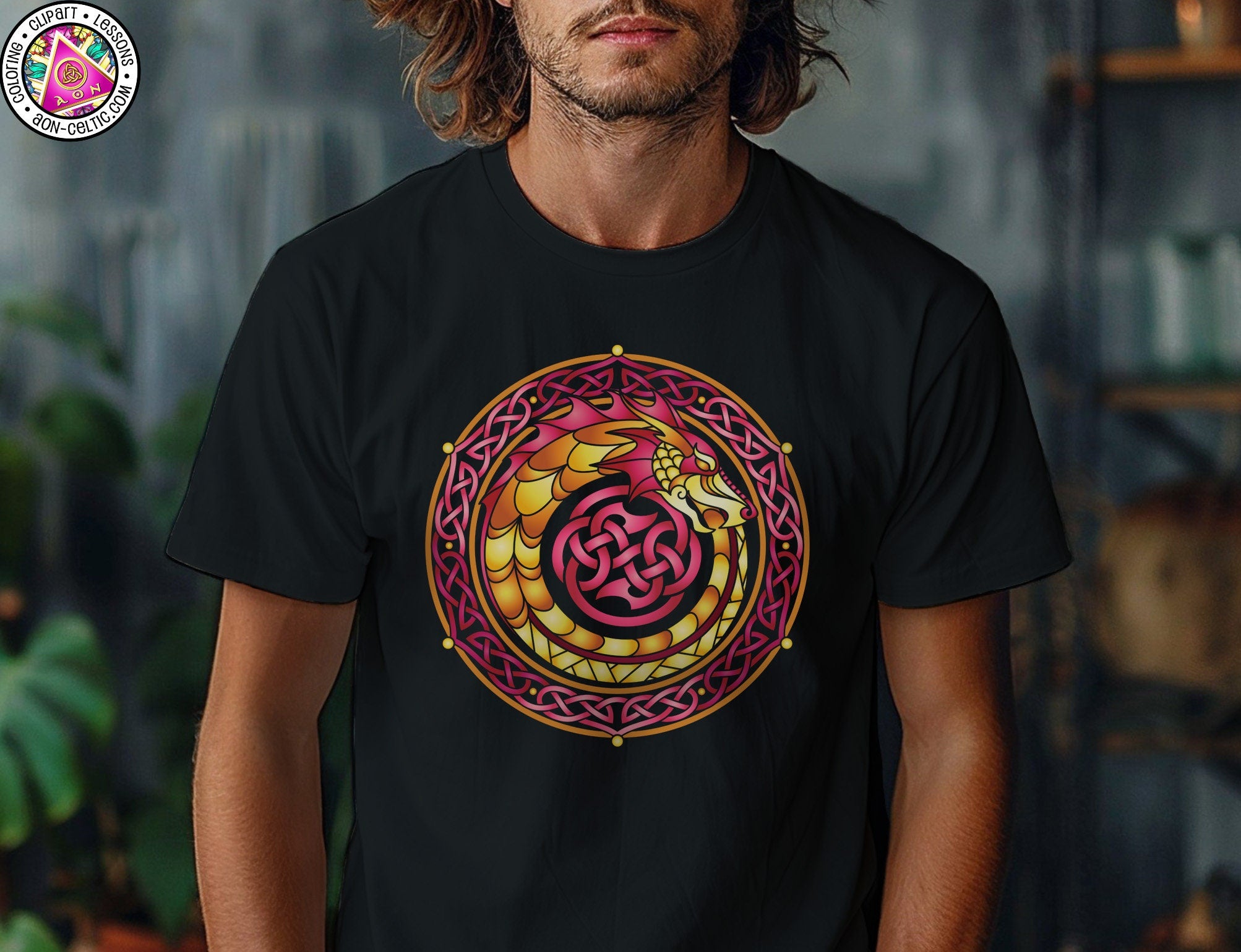 a man wearing a black t - shirt with a red and yellow design on it