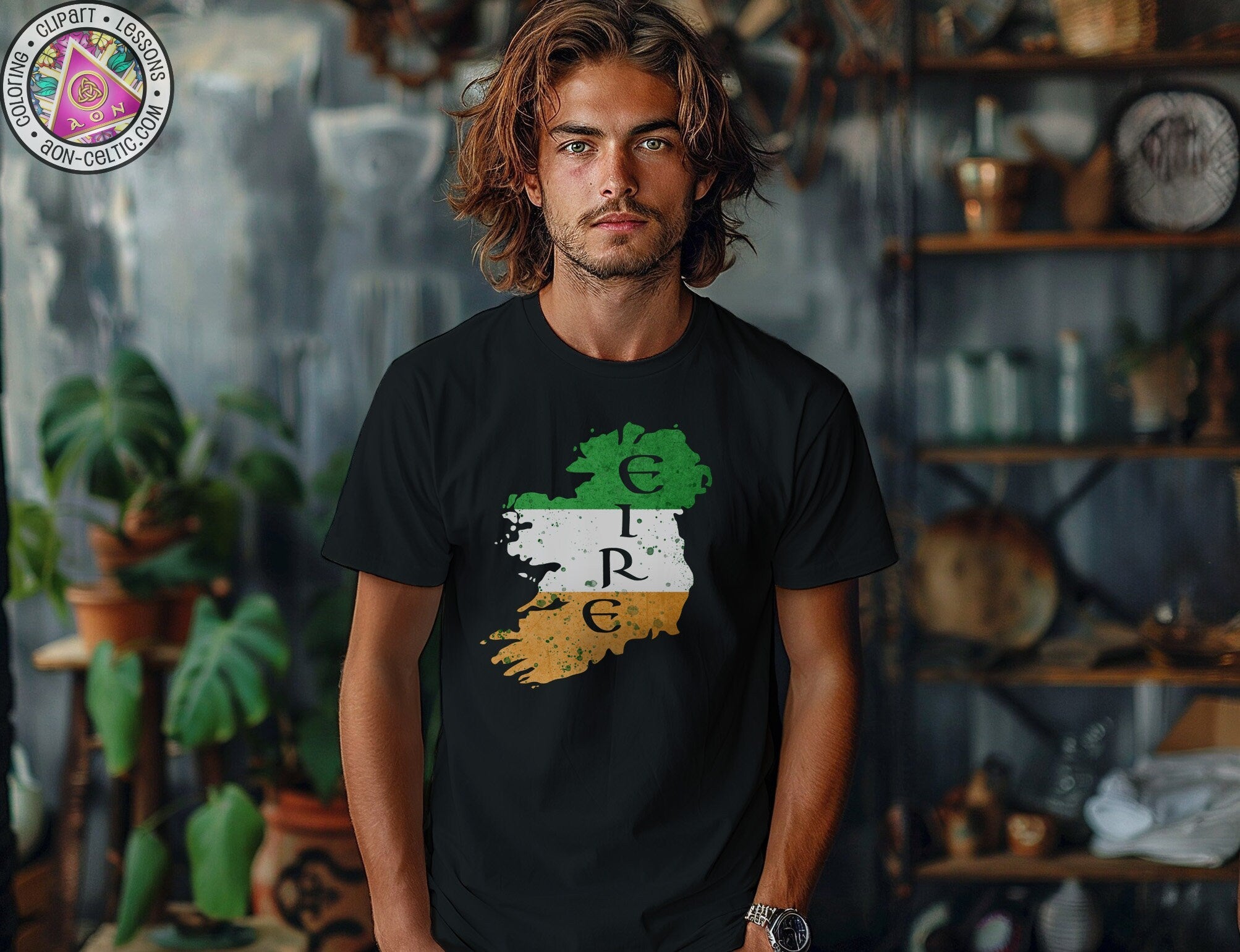 a man wearing a black t - shirt with a green tree on it