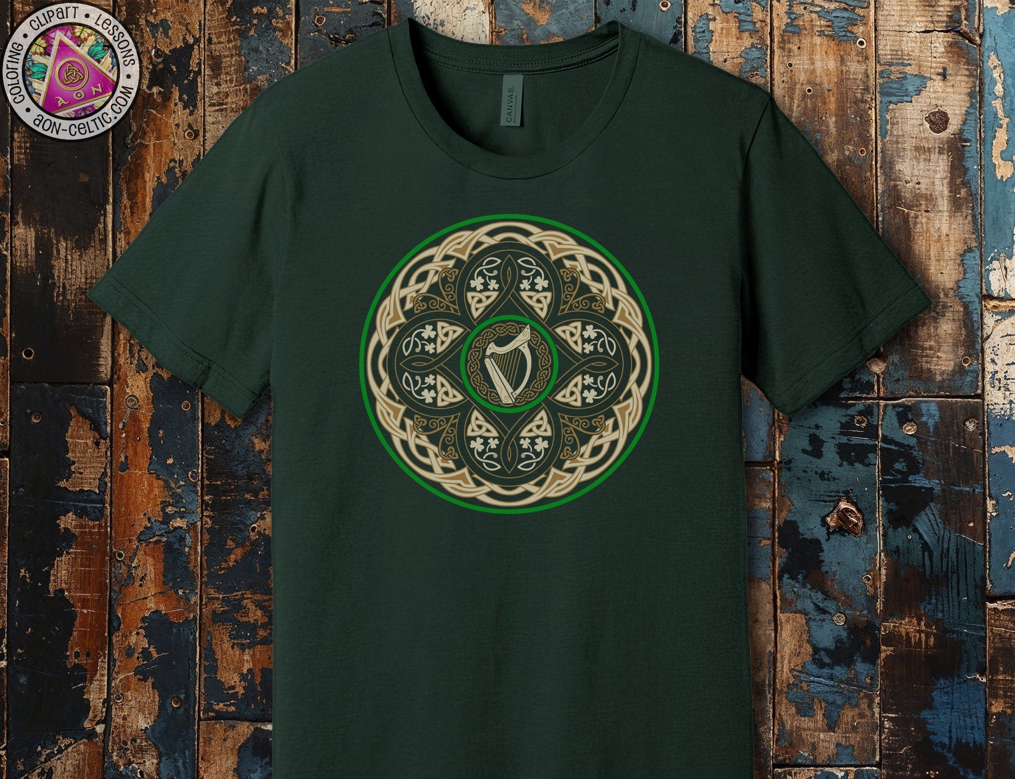 a green t - shirt with a celtic design on it
