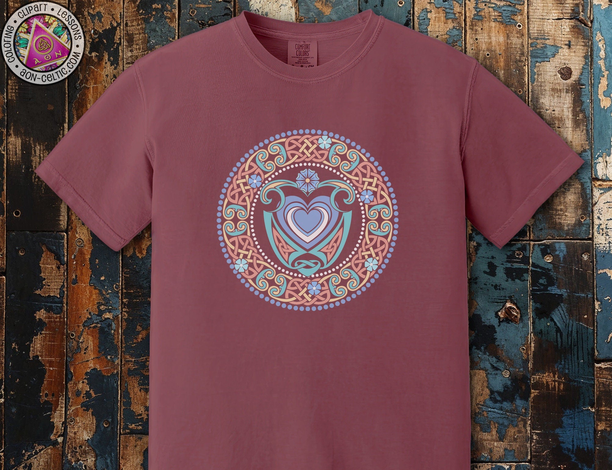 a t - shirt with a heart in the middle of it