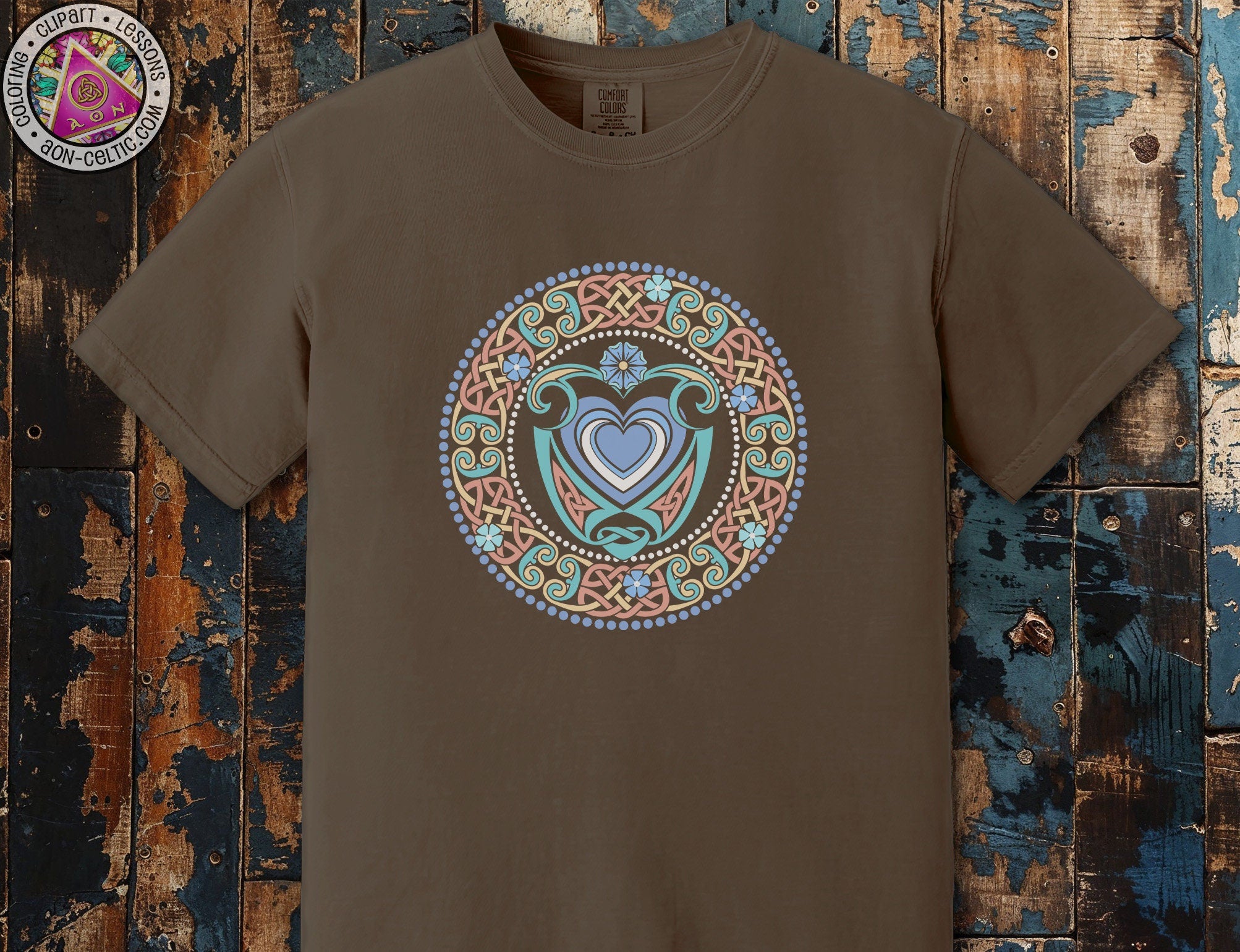 a brown t - shirt with a blue heart in a circle