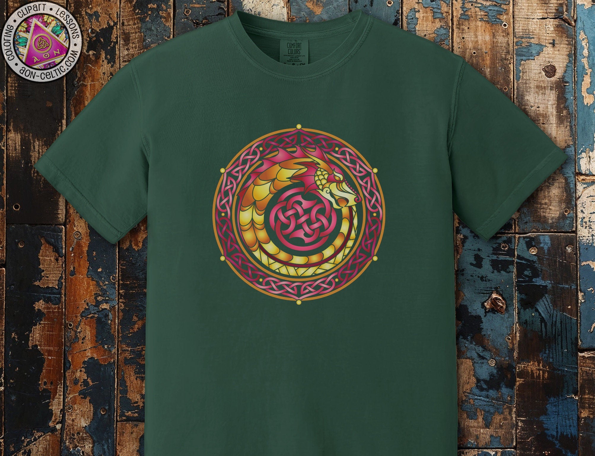 a green t - shirt with a red and yellow design on it