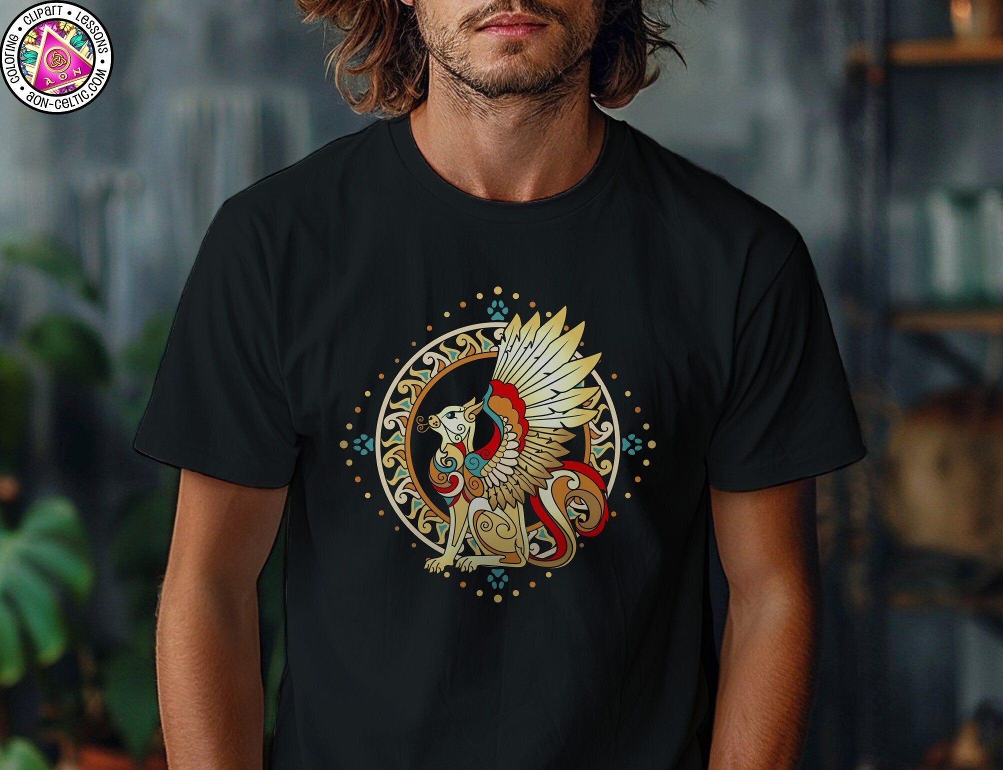 a man wearing a black t - shirt with a gold eagle on it