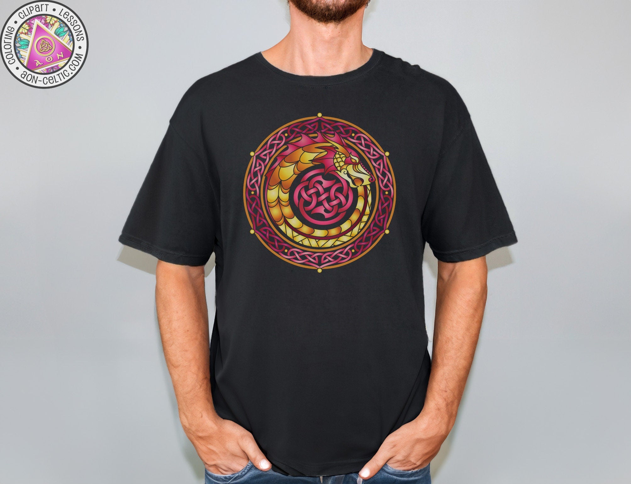 a man wearing a black t - shirt with a red and yellow snake on it