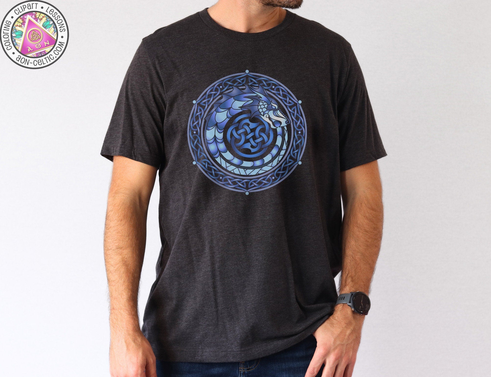 a man wearing a black shirt with a blue design on it