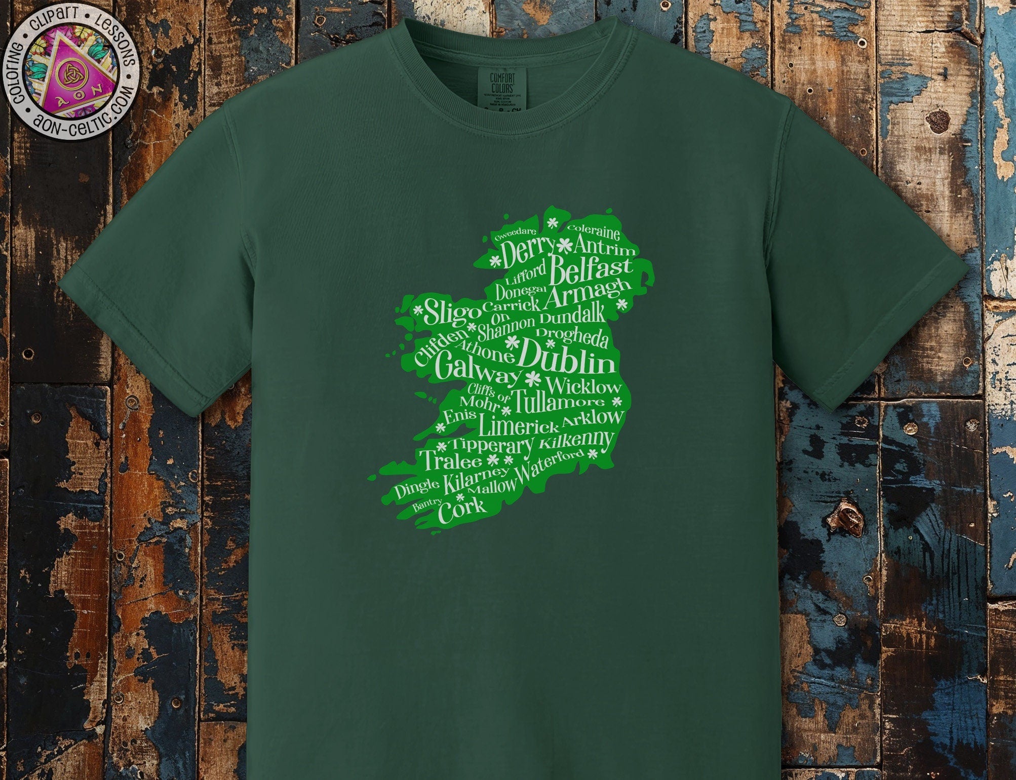 a green t - shirt with words written in different languages