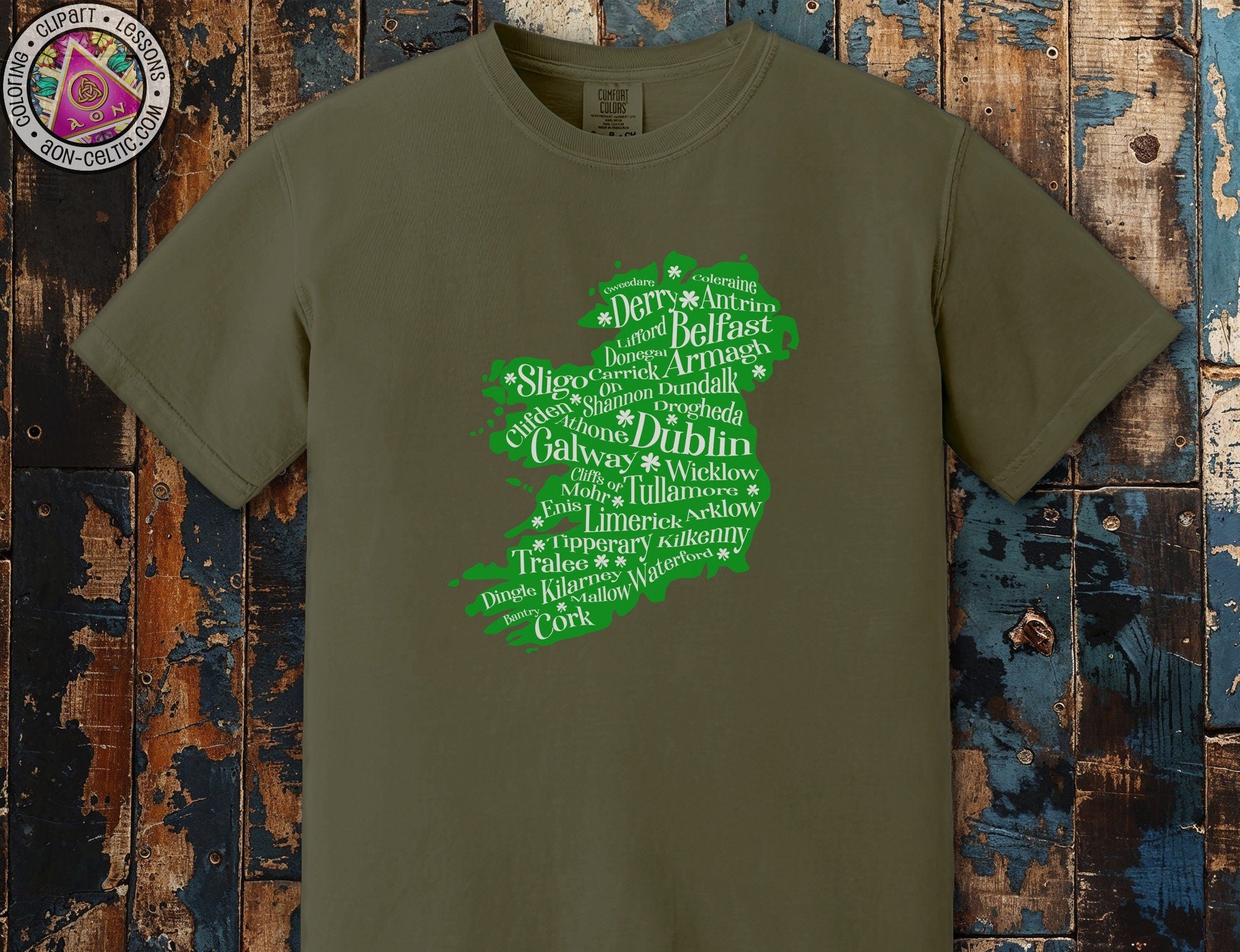 a green t - shirt with words written in different languages